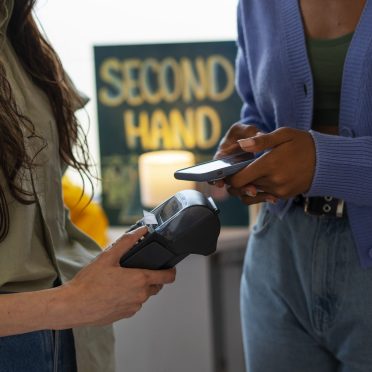 side-view-woman-paying-with-card side-view-woman-paying-with-card